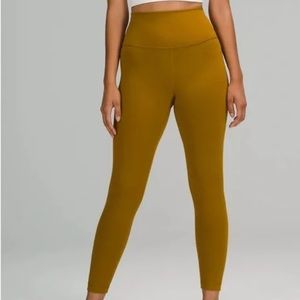 Wunder train high rise tight size 0 in gold spice